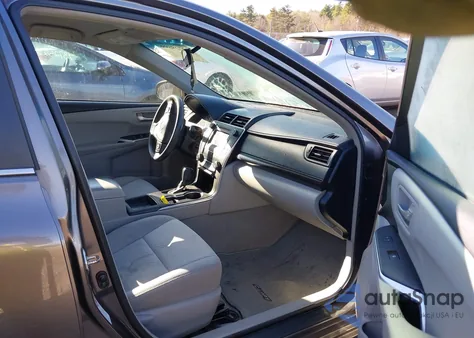 2015 Toyota Camry Le z USA, uszkodzony, nr VIN 4T4BF1FKXFR468536